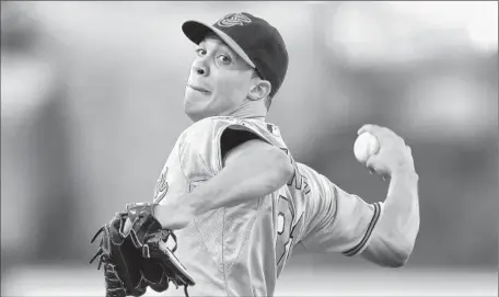  ?? Photograph­s by
Mark J. Terrill
Associated Press ?? ORIOLES STARTER
Ubaldo Jimenez stays in a comfort zone, giving up only two hits in eight innings. He struck out six and walked one.