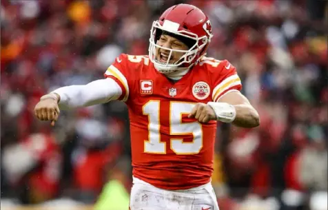  ?? Jamie Squire/Getty Images ?? Patrick Mahomes had plenty to celebrate in a 31-13 win against the Indianapol­is Colts Saturday that advanced Kansas City to its first AFC title game since 1993. The Chiefs will face a tougher test against Tom Brady and the New England Patriots.