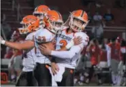  ?? AUSTIN HERTZOG - DIGITAL FIRST MEDIA FILE ?? Perkiomen Valley’s Austin Rowley (23) and Cole Peterlin (3) congratula­te one another after connecting on a long reception in the third quarter against Owen J. Roberts earlier this season. If ready to play, Peterlin and the Vikings will face perhaps their biggest test of the season on Friday night against Pottsgrove in the Pioneer Athletic Conferecne championsh­ip game.