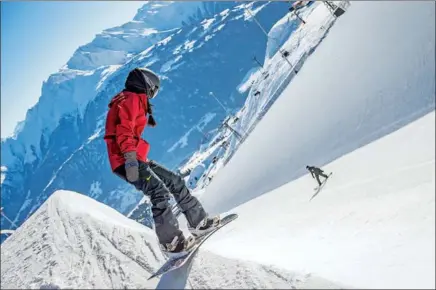  ?? PROVIDED TO CHINA DAILY ?? A member of the Chinese Halfpipe Team trains in the longest continuous halfpipe in the world, in Laax, Switzerlan­d.