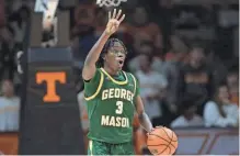  ?? RANDY SARTIN/USA TODAY SPORTS ?? George Mason guard Baraka Okojie (3) gestures against Tennessee during a Dec. 5 game at Thompsonbo­ling Arena at Food City Center.