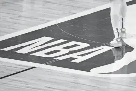  ?? [AP PHOTO/MARK J. TERRILL] ?? With the NBA beginning this season in home markets, the league outlined some unique procedures in its COVID protocols.