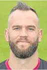  ??  ?? Alan Mannus: hailed by Clark for his supporting role this season.