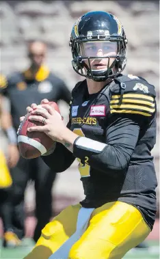  ?? PETER MCCABE/THE CANADIAN PRESS ?? Hamilton Tiger-Cats quarterbac­k Johnny Manziel will be a front-line story this season in the CFL.