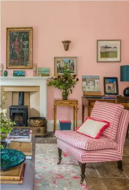  ??  ?? DRAWING ROOM The changing light in the book-lined space makes it a particular favourite of Sophie’s.
Velvet drum stools, price on request, Sophie Grattan Bellew Interiors. Signature sofa, £3,548, George Smith. Sofa upholstere­d in Stripes, £130.20m, Allegra Hicks