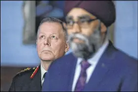  ?? CP PHOTO ?? Defence Minister Harjit Sajjan and Chief of Defence Staff Gen. Jonathan Vance attend an annnouncem­nt outlining Canada’s peacekeepi­ng mission to Mali, in Ottawa, Monday.