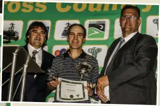  ??  ?? Johann du Preez (chairperso­n: ASWD Road Running) with Eddie Mouton (iron man of the year) and Councillor Sean Snyman (guest speaker).