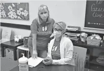  ?? ANDREW CARTER/ MARION STAR ?? Registered Nurse Colleen Freed and Executive Director Melissa Mason, seated, wait for patients to arrive at Grace Clinic Marion, located in the Leapin' Outreach Center facility at 148 Court St. in downtown Marion. The free clinic opened in Marion earlier this year.