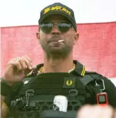  ?? AP FILE ?? Proud Boys leader Henry “Enrique” Tarrio wears a hat that says The War Boys and smokes a cigarette at a 2020 rally in Portland, Oregon.