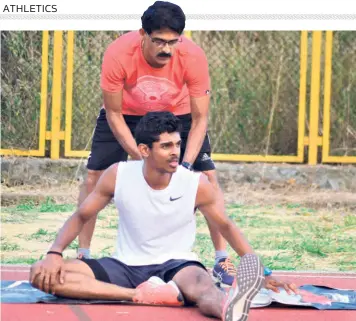  ?? THE HINDU PHOTO LIBRARY ?? Cautious approach: India’s national long jump record holder M. Sreeshanka­r with his father S. Murali during a training session. “After tennis stars Novak Djokovic and Grigor Dimitrov, two of the fittest athletes in the world, tested positive it’s clear that all of us have to take a lot of precaution­s to stay safe,” says the youngster.