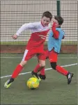  ?? 01_A03footy05 ?? An Arran player turns his opponent.