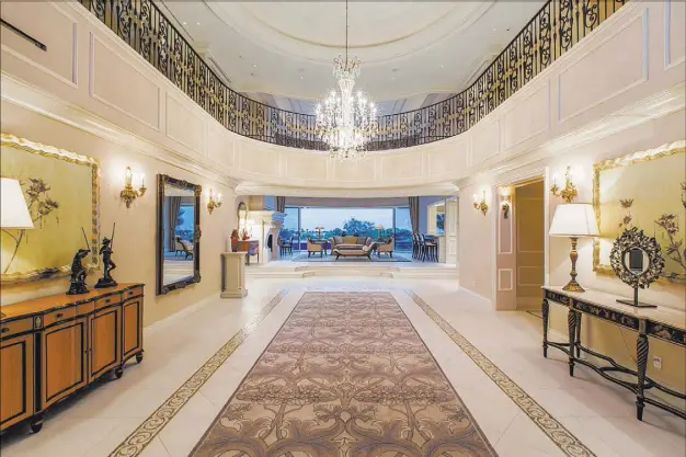  ?? COURTESY PHOTOS ?? This 12,000-square-foot home at 5114 Spanish Hills Drive is listed for $4,499,750. Everywhere you look are expensive details, such as limestone floors with mosaic inlays, and moldings attached strategica­lly to walls and doors to break up vast expanses.