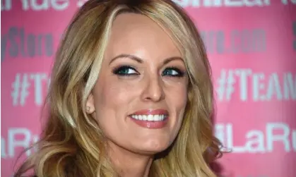  ?? Photograph: Robyn Beck/AFP/Getty Images ?? Stormy Daniels, whose legal name is Stephanie Gregory Clifford, supported herself financiall­y by working in strip clubs, and eventually appeared in porn films.