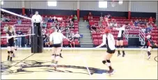  ?? TIMES photograph by Annette Beard ?? Varsity Lady Blackhawks won three of five sets Thursday night in Blackhawk Gym against Prairie Grove.