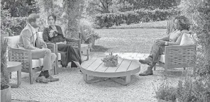  ?? PROVIDED BY JOE PUGLIESE/ HARPO PRODUCTION­S ?? Prince Harry and Duchess Meghan of Sussex sat down with Oprah Winfrey in the backyard of their California home for a two- hour interview airing Sunday on CBS.