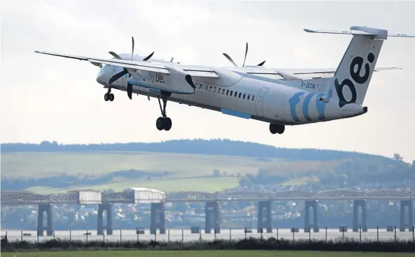  ??  ?? A plane taking off at Dundee Airport.