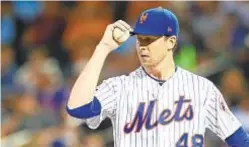  ?? GETTY ?? It’s another frustratin­g night for Jacob deGrom, who allows two runs over eight innings and still takes a loss.