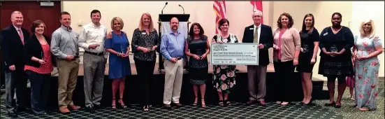  ??  ?? Leadership Catoosa Class of 2017 donated $11,372.83 to the Catoosa Home Delivered Meals Program during the graduation ceremony Thursday, June 8, for the Leadership Class. From left: Lee Tubbs, Chamber Chair; Jessica Yarber, Communitie­s in Schools; John...