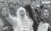  ??  ?? Contractua­l employees of National Health Mission protesting in Srinagar on Tuesday. WASEEM ANDRABI /HT