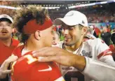  ??  ?? The 49ers’ Jimmy Garoppolo (right) went one way, and the Chiefs’ Patrick Mahomes the other, starting in the fourth quarter of Super Bowl LIV.