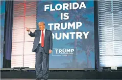  ?? PHELAN M. EBENHACK/THE ASSOCIATED PRESS ?? Former President Donald Trump acknowledg­es attendees Saturday before speaking at the Republican Party of Florida Freedom Summit in Kissimmee, Fla.