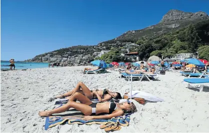  ?? Picture: SHELLEY CHRISTIANS ?? HOLIDAY HAZARD: Clifton Beach, Cape Town, is a visitor drawcard, but crime threatens tourism revenue