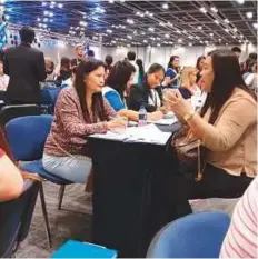  ??  ?? Thousands of Filipinos gathered at the Dubai World Trade Centre on Friday for the 120th Philippine Independen­ce Day celebratio­n, which started at 8am. The job fair was just a segment of the day-long cultural event.