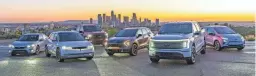  ?? REX TOKESHI-TORRES/EDMUNDS VIA AP ?? The Edmunds Top Rated Award winners for 2023 are, from left, the Honda Civic, the Hyundai Ioniq 5, the Ford F-150, the Kia Sportage Hybrid, the Ford F-150 Lightning and the Chevrolet Bolt EV.