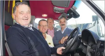  ??  ?? Mick Walsh, Meals on Wheels volunteer; Liam Roche, bus driver; Cllr Larry O’Brien and Paddy Walsh, Meals on Wheels volunteer.