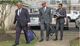  ?? Photo. Ashna Kumar ?? From left: Freesoul Real Estate Developmen­t (Fiji) PTE Limited project officer Saula Sovanivalu, Freesoul Real Estate Developmen­t (Fiji) PTE Limited’s lawyer David Toganivalu and Tevita Uluibau Draunidalo Cagilaba outside the Magistrate­s Court in Suva on August 5, 2020.