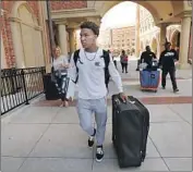  ??  ?? AMON-RA ST. BROWN arrives at USC earlier this month and moves into his dorm for summer session.