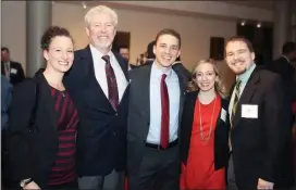  ?? SUBMITTED PHOTO ?? Author Sean Hand, center, is pictured with his sister Katie Staudt, father Art Hand III, wife Kristin Hand, and brother Art Hand IV at a Young Hearts of Philadelph­ia fundraiser event. Young Hearts of Philadelph­ia is a group of young profession­als that support the American Heart Associatio­n. Hand is the founder and former chair of the group.