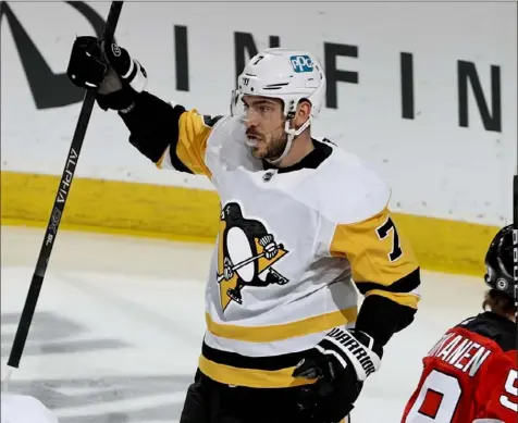  ?? Elsa/Getty Images ?? Colton Sceviour celebrates the first of his two goals in the first period in the Penguins’ 5-2 win against the New Jersey Devils.