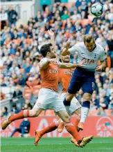  ?? — AFP ?? Tottenham Hotspur’s English striker Harry Kane scores a headed goal that was disallowed for off-side during an English Premier League match against Arsenal at the Wembley Stadium in London on Saturday.