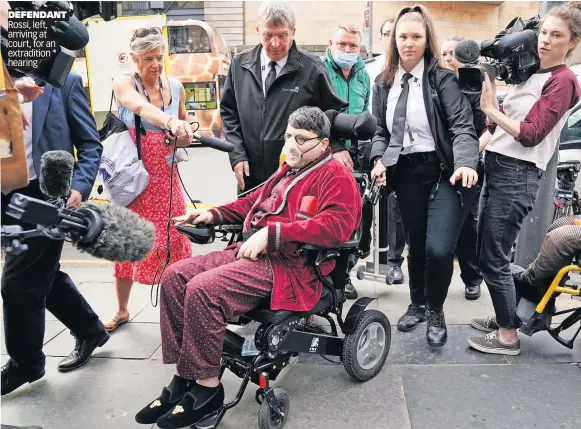  ?? ?? DEFENDANT Rossi, left, arriving at court, for an extraditio­n hearing