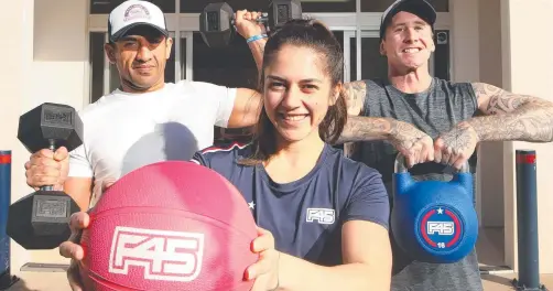  ?? Picture: GLENN HAMPSON ?? Ricci Herbig, Jai Herbig and Matt Wilson are ready to train at F45 Helensvale when it reopens, after abruptly closing.