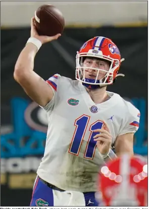  ?? (AP/John Raoux) ?? Florida quarterbac­k Kyle Trask, shown last week during the Gators’ victory over Georgia, has passed for 1,815 yards and 22 touchdowns with only 3 intercepti­ons heading into Saturday’s game against Arkansas.