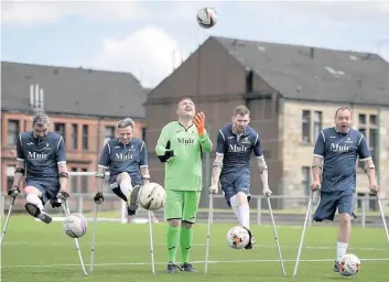  ??  ?? On the ball Scotland’s amputee football team will take on the Netherland­s later this month