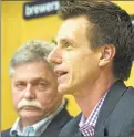  ?? MARK HOFFMAN/ JOURNAL SENTINEL ?? New Milwaukee Brewers manager Craig Counsell (right) is introduced Monday by general manager Doug Melvin.