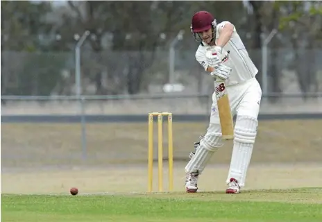  ??  ?? SAFETY FIRST: Highfields batsman Ben Trimmer blocks a ball towards the covers during the first round of the Harding-Madsen Shield against Brothers.