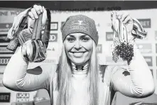  ?? Jonathan Nackstrand / AFP/Getty Images ?? With a final medal Sunday at the world championsh­ips, Lindsey Vonn ends her career as the most decorated female skier in history.