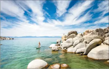  ?? GO TAHOE NORTH ?? The idyllic 55-acre Sand Harbor at Lake Tahoe offers white-sand beaches, coves and water sports, including kayaking and stand-up paddleboar­ding.