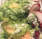  ?? CAROL DEPTOLLA/MILWAUKEE JOURNAL SENTINEL ?? Guacamole with the pomegranat­e seeds traditiona­l in some areas of Mexico is on the menu at La Dama, 839 S. Second St. in Walker’s Point.