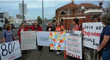  ?? PHOTO: TARA MIKO ?? BOYCOTT CALLS: Protesting Adani are (from left) Antonia Van Guens, Helen Geyer, Andrew Nicholson, Annemarie Manners, Rebecca Manners, Sheryl Kreusler, Robert Watson and Carmel Neagle.