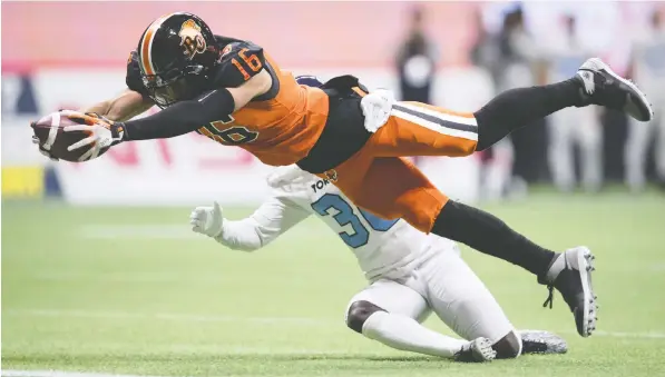  ?? — THE CANADIAN PRESS ?? Bryan Burnham made a pair of glorious touchdown catches to push his season total to nine Saturday, tying him with Hamilton’s Brandon Banks for the league lead. He also jumped back ahead of Banks in receiving yards during the 55-8 win at home over the Argonauts.