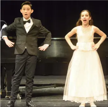  ?? JAMES MILLER/Penticton Herald ?? Justin Gin and Isabella Cucnik perform together at the 96th annual Penticton Kiwanis Music Festival highlights show, Saturday evening at the Cleland Theatre.