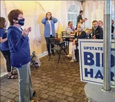  ??  ?? Albany Mayor Kathy Sheehan speaks during a victory party at Mcgeary’s Pub on Saturday to celebrate the election of former Vice President Joe Biden and Senator Kamala Harris as president and vice president, respective­ly.