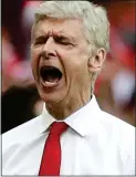  ??  ?? CAN’T LOOK: but Wenger celebrates