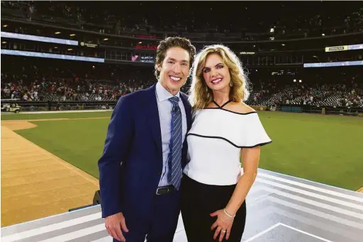  ?? Courtesy photo ?? Joel and Victoria Osteen at Comerica Park in Detroit for “America’s Night of Hope,” which airs on the Hallmark Channel Sunday evening.