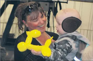  ??  ?? BEST DAY: Horsham’s Lee Patterson and grandson Brax Patterson (Elsom) share a moment at a carnival in Brax’s honour at Horsham Showground. Brax, 23 months, has a rare brain tumour and his family is determined to ensure his final days are filled with...